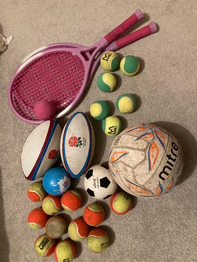 Preview of the first image of Assorted balls and tennis racquets.