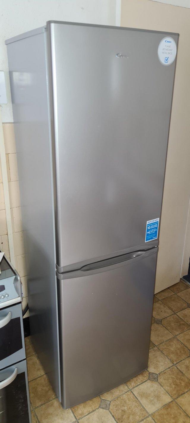 Preview of the first image of Almost new Candy fridge freezer.
