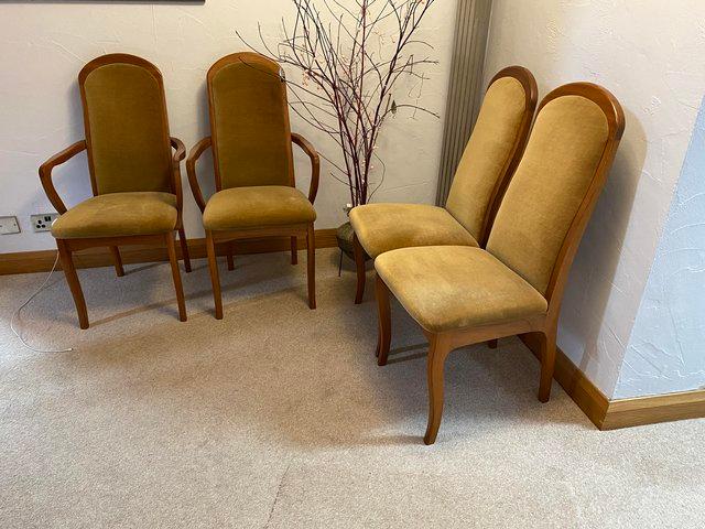 Preview of the first image of 4 teak and velour dining chairs/ table available.