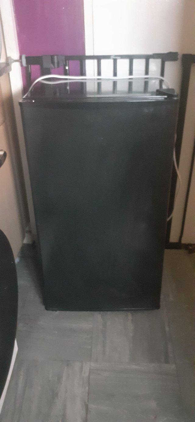Preview of the first image of Small black under counter fridge GWO.