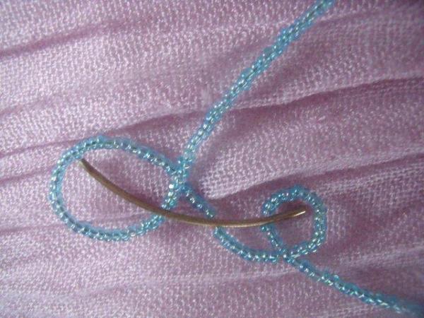 Image 2 of 2 different turquoise/turquoise mixed colour bead necklaces.