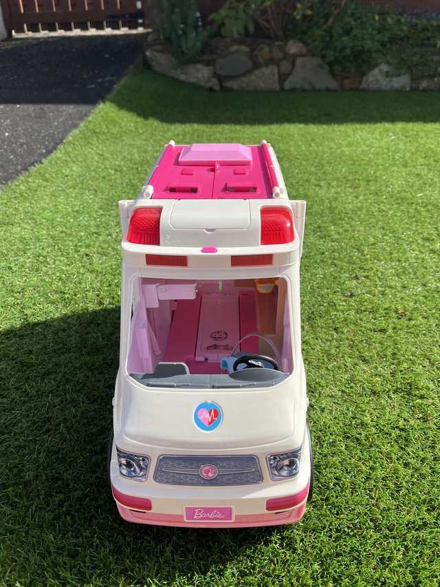 Preview of the first image of Barbie ambulance  open up to play.