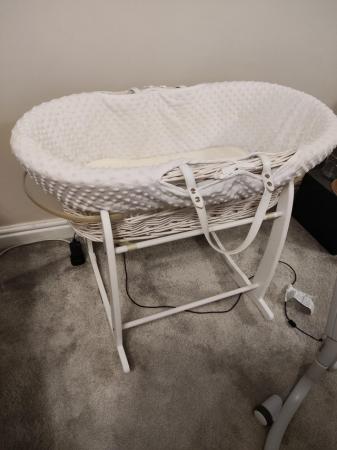 Image 2 of Moses basket with stand rocking