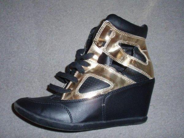 Image 1 of Black and Gold Wedge Trainers from Forever 21