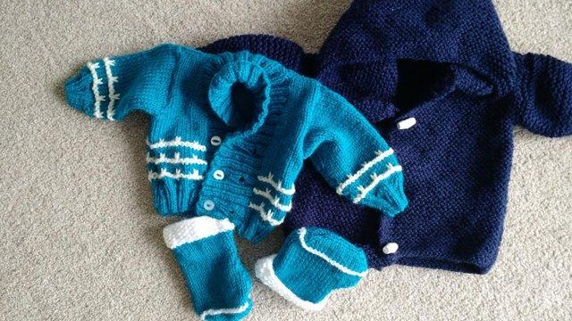 Image 1 of Baby 2 knitted cardigans 0-4 months brand new