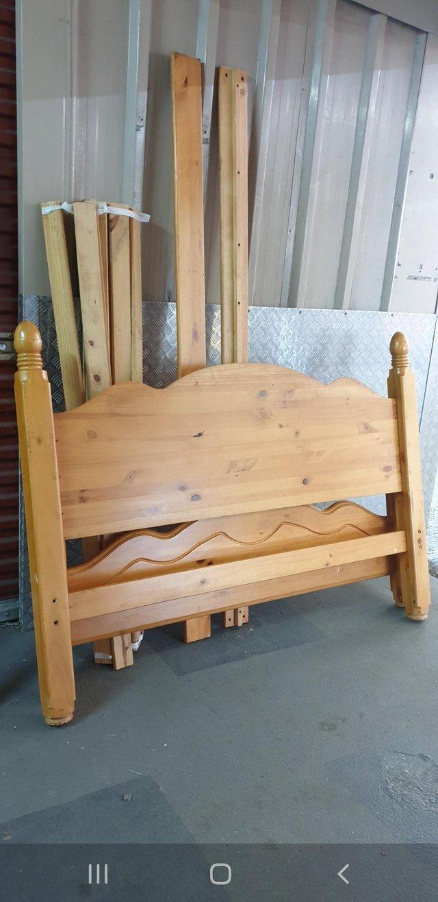 Preview of the first image of Solid wooden king size bed frame.