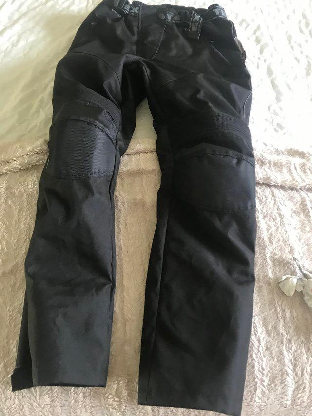 Preview of the first image of Women’s Tex canvas motorcycle trousers.