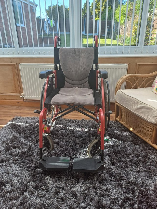 Preview of the first image of Karma Mobility self propelling wheelchair for sale.