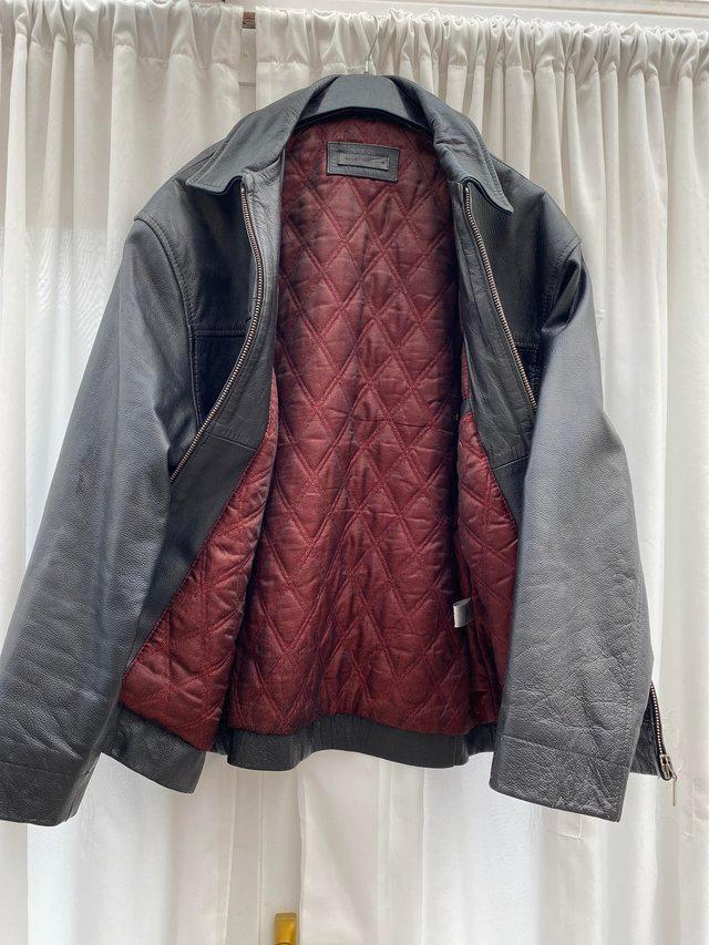 Preview of the first image of Mens or ladies leather zip jacket.