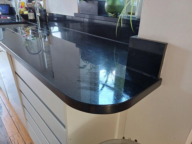Preview of the first image of Solid granite worktops in good used condition.