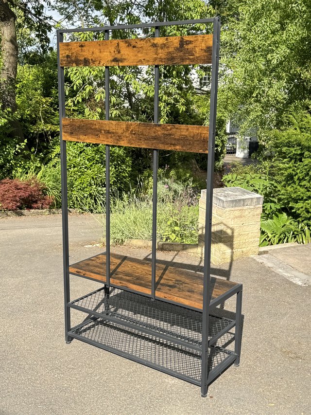Preview of the first image of 12 hook floor standing coat & shoe rack with bench.
