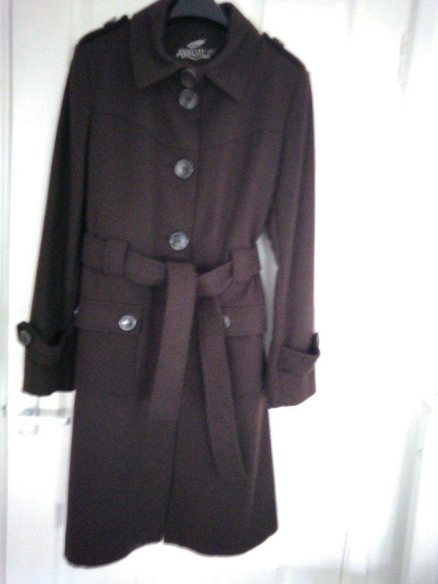 Preview of the first image of Womens dark brown wool coat size 14..