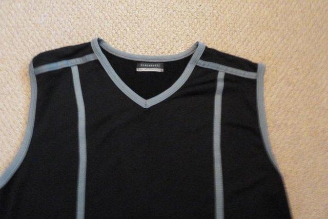 Preview of the first image of Men's Sleeveless Style Black Clubwear Top.
