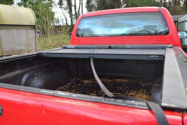 Image 2 of Toyota Pick Up Mountain Top Roll and Lock Cover.