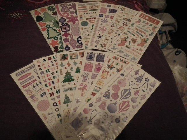 Preview of the first image of 10 sheets of stickers & 2 sheets Christmas chipboard shapes.
