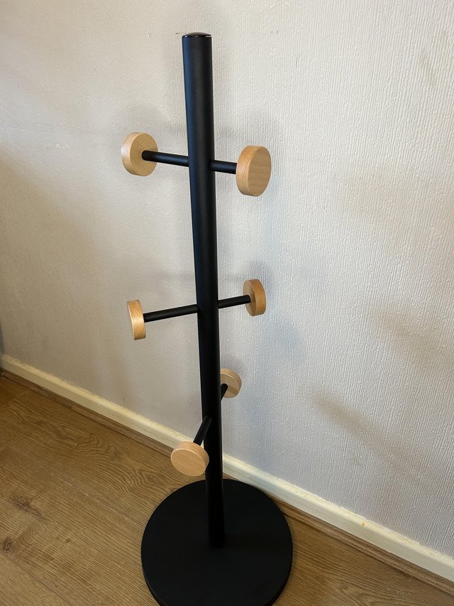 Preview of the first image of Black and Wood Hat Rack - John Lewis.