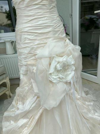 Image 18 of Wedding Dress by designer Ian Stuart size 12