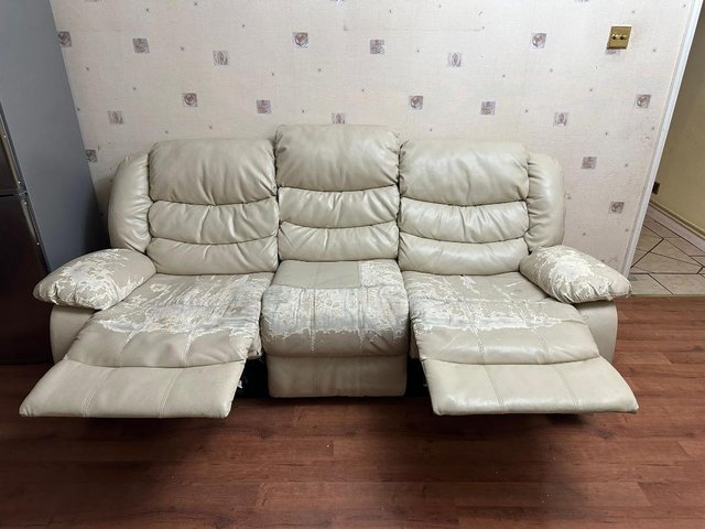 Preview of the first image of 3 seater very old sofa  leather recliner.