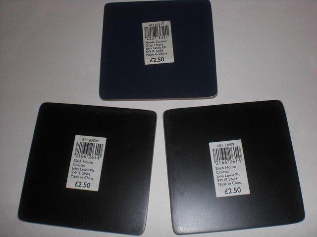 Preview of the first image of John Lewis House Coasters Black And Grey.