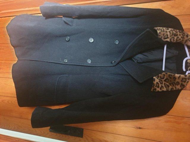 Preview of the first image of Ladies winter coat. size 14. 80 percent wool and 20 percent.