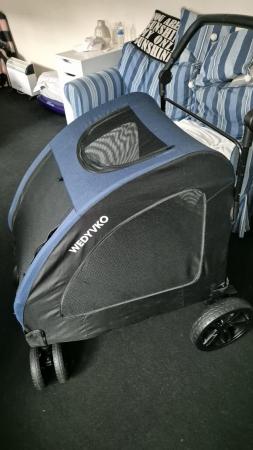 Image 3 of Dog stroller.blue with black net.