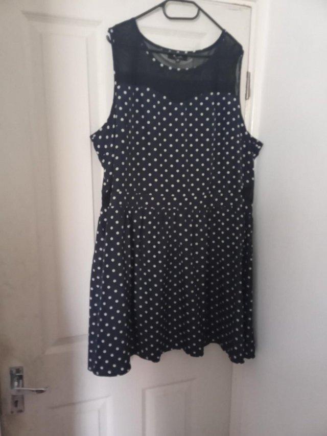 Preview of the first image of Cutie Navy Polka Dot Sheer Yoke.