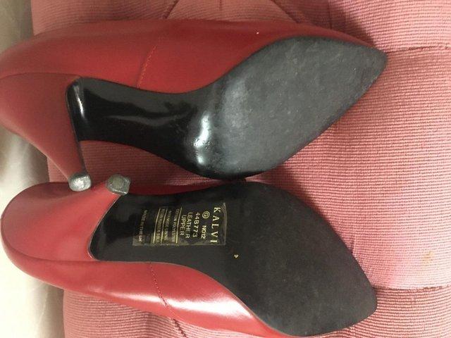 Preview of the first image of Red Shoes size 4.5 with heels + other shoes nice condition.