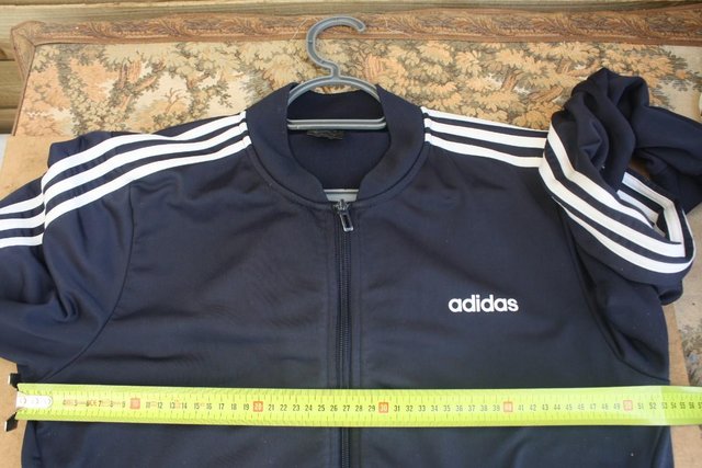 Preview of the first image of addidas mens blue tracksuit top.