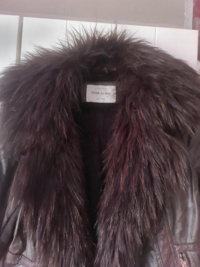 Preview of the first image of River Island faux fur/ leather jacket as new see below.