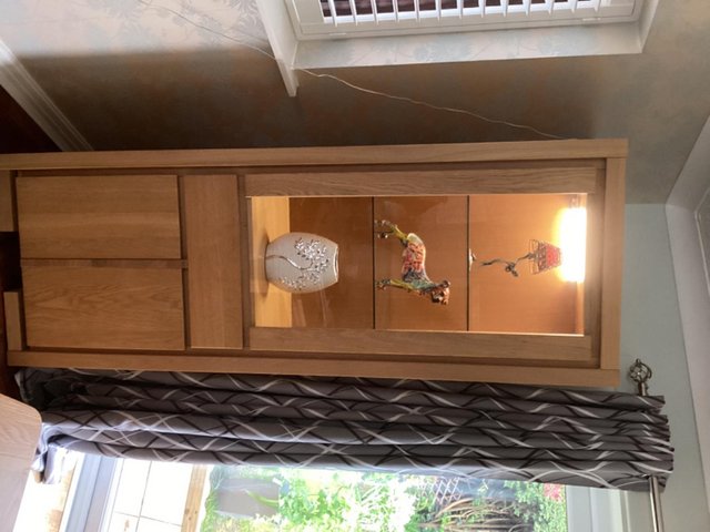 Preview of the first image of Oak Windsor display cabinet ,with drawer, cupboard,.