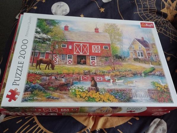Image 1 of 2 2000 piece jigsaw puzzles.