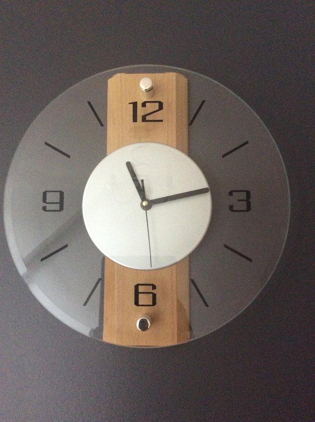 Preview of the first image of Household wall clock wood/glass.