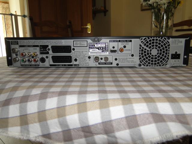 Preview of the first image of Sony DVD recorder Model No. RDR-HXD790 with remote control.