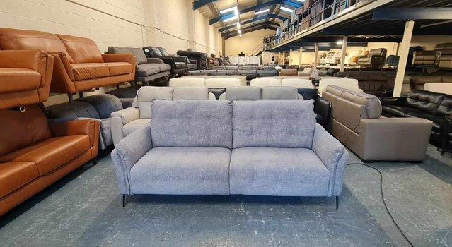 Preview of the first image of Bolzano grey fabric electric recliner 3 seater sofa.