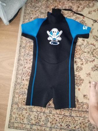 Image 2 of For sale, three child's wet suits