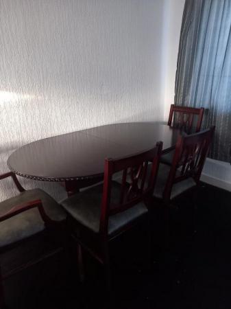 Image 2 of Dark wood dining table with 6 chairs including 2 carvers