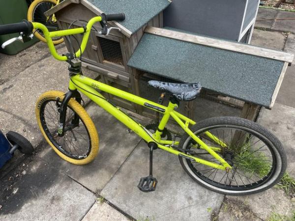 Image 2 of Two yellow / green bmx bikes