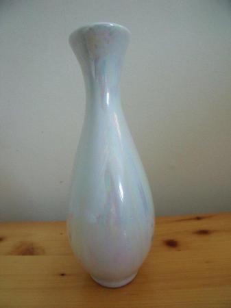 Image 2 of Iridescent ceramic vase with delicate lilac flower design.