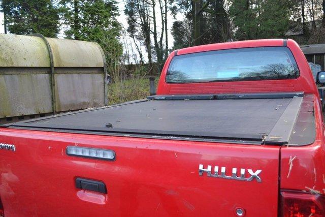 Preview of the first image of Toyota Pick Up Mountain Top Roll and Lock Cover..