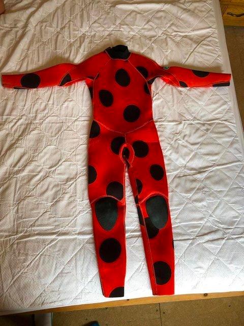 Preview of the first image of Saltskin Ladybird Wetsuit.Large (8-12y) Full length 3mm un.