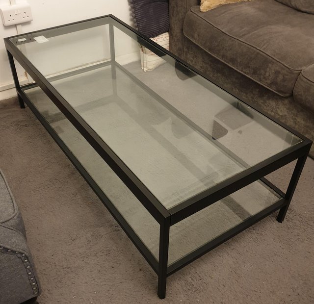 Preview of the first image of Large sturdy glass coffee table with metal frame.