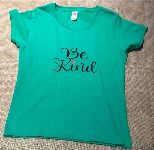 Preview of the first image of Ladies green large Tshirt brand new.