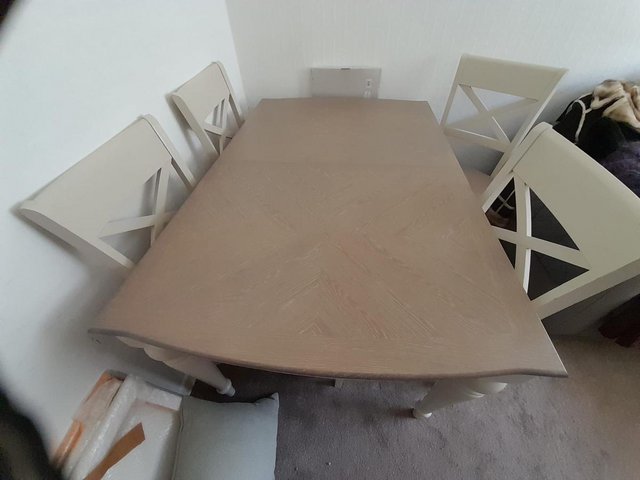 Preview of the first image of Solid Wood Herringbone Top Table & Four Chairs.