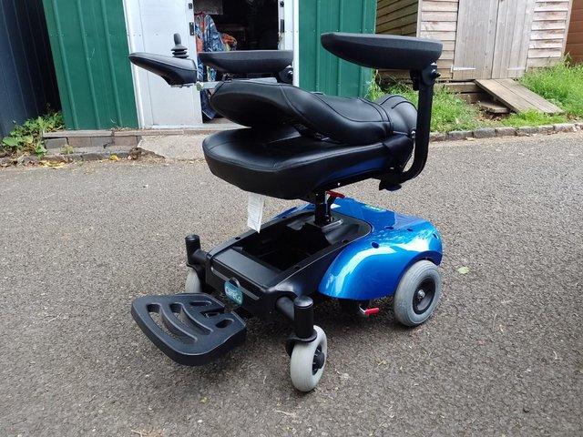 Preview of the first image of care co easy go power wheelchair.