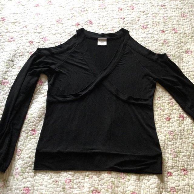 Preview of the first image of Size 12 NEXT Slinky Jet Black Cold-Shoulder Long Sleeve Top.