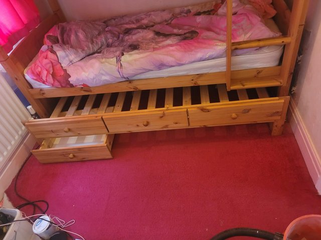 Preview of the first image of Solid wood triple bunk beds.