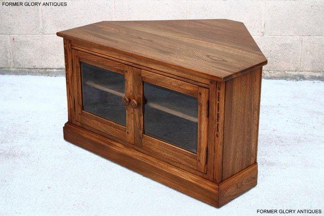 Image 66 of AN ERCOL GOLDEN DAWN ELM CORNER TV CABINET STAND TABLE UNIT
