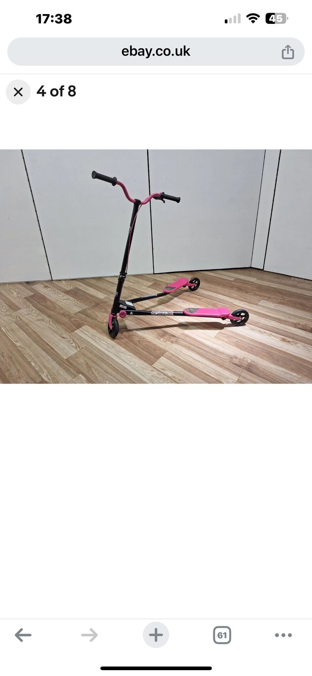 Preview of the first image of Pink and black scissor scooter.