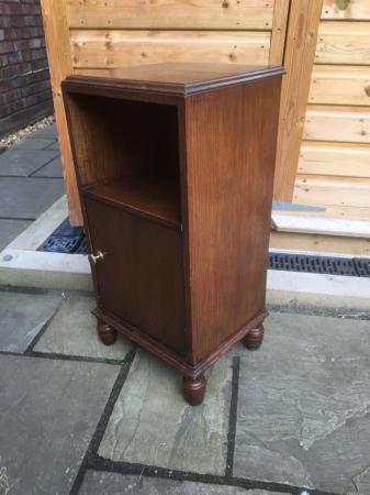 Image 3 of A Wareing & Gillow oak cabinet with turned feet.