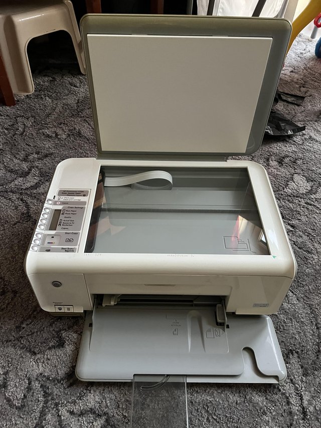 Preview of the first image of HP Photosmart C3180 all in one printer.